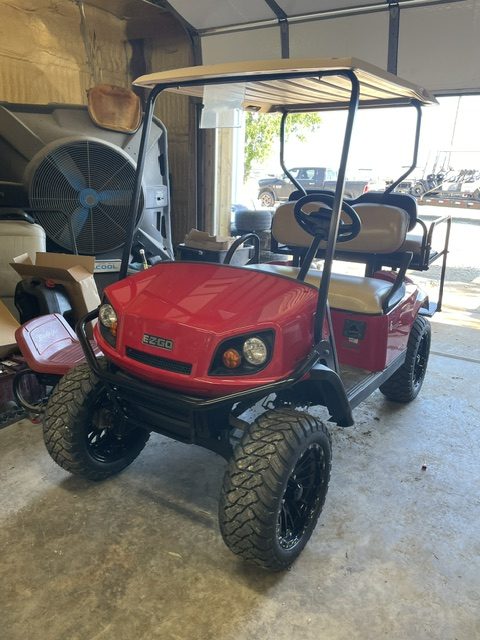 INSTOCK 5/11/26 2021 RED EZGO LIFTED 4" W/ 23" TIRES TXT 48V EZGO TXT 48V S4 BODY W/ LIGHTS, NEW BATTERIES W/ 12 MONTH WARRANTY