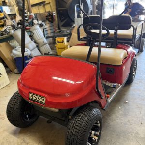 INSTOCK 8/11/26 NICE FLAME RED 2013 EZGO TXT GOLF CART NEW US BATTERIES ,SEATS & NEW WHEELS / TIRES , HAS FUNCTIONING LIGHTS AND BATTERY GAUGE. RUNS/ DRIVES GOOD !