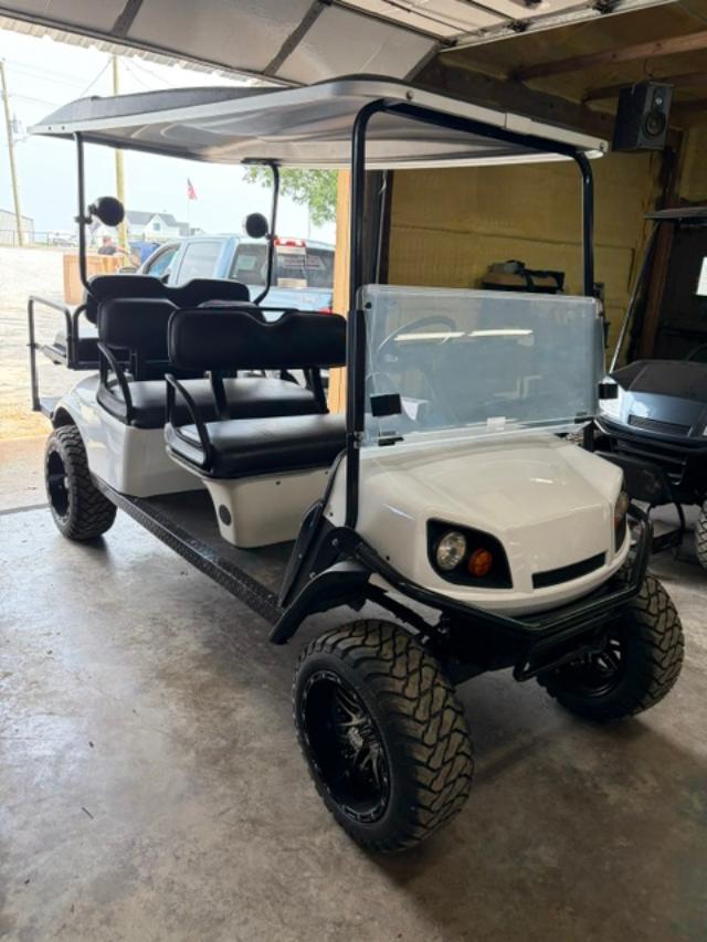 JUST FINISHED 8/21/26 WHITE 2015 CUSTOM FACTORY 6 SEATER ALL NEW BODY, TRIM, BRUSHGUARD, SEATS, MARINE STEREO W/LIGHTED KICKER SPEAKERS, 4" EZGO AXLE LIFT KIT, LIGHTS, 23" TERRAIN TIRES 8/ 6 VOLTS FOR LONGER RUN TIMES ONLY ON FACTORY 6 SEATERS - Image 3