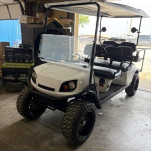 JUST FINISHED 8/21/26 WHITE 2015 CUSTOM FACTORY 6 SEATER ALL NEW BODY, TRIM, BRUSHGUARD, SEATS, MARINE STEREO W/LIGHTED KICKER SPEAKERS, 4" EZGO AXLE LIFT KIT, LIGHTS, 23" TERRAIN TIRES 8/ 6 VOLTS FOR LONGER RUN TIMES ONLY ON FACTORY 6 SEATERS