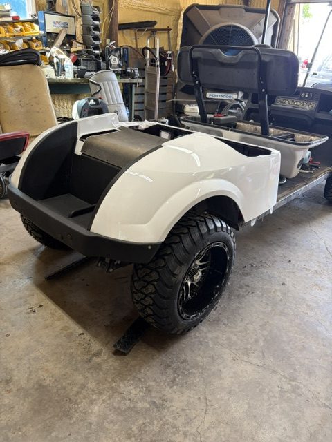 BEING BUILT NOW 8/7/26 WHITE 2015 CUSTOM FACTORY 6 SEATER ALL NEW BODY, TRIM, BRUSHGUARD, SEATS, MARINE STEREO W/LIGHTED KICKER SPEAKERS, 4" EZGO AXLE LIFT KIT, LIGHTS, 23" TERRAIN TIRES 8/ 6 VOLTS FOR LONGER RUN TIMES ONLY ON FACTORY 6 SEATERS - Image 2